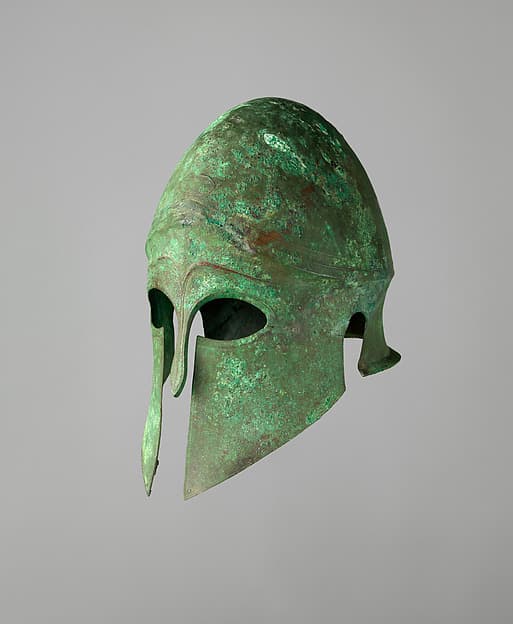 Helmet of the Corinthian Type and Pair of Greaves