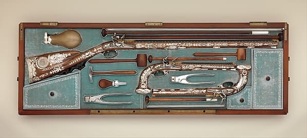 Cased Set of a Flintlock Rifle, a Pair of Pistols, and Accessories, by Nicolas Noël Boutet
