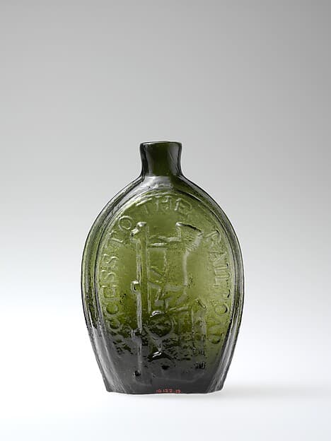 Figured flask, by Keene Glass Works