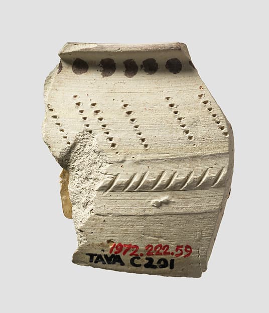 Bowl rim sherd with comb impressions