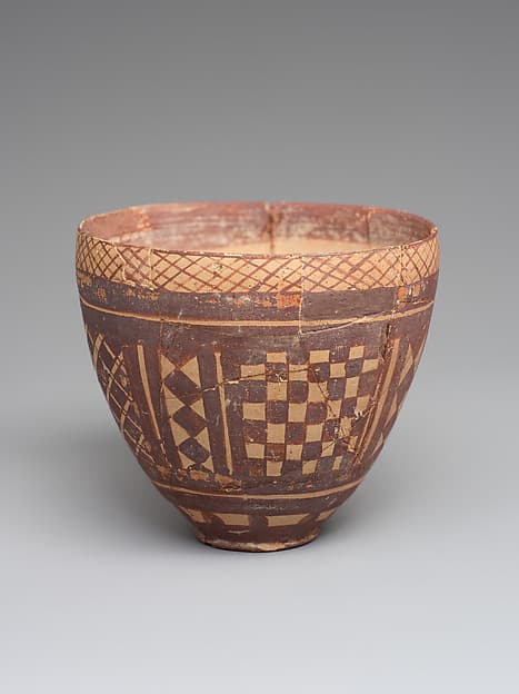 Cup with geometric decoration