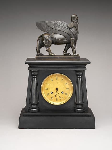 Clock with human-headed winged lion