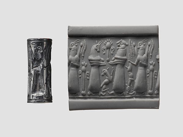 Cylinder seal and modern impression: animal-headed divinities with prey