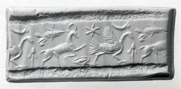 Cylinder seal (with caps preserved) with animals and divine symbols