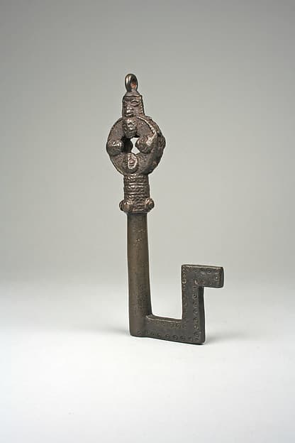 Key, by Ìgùn Ẹ́rọ̀nwwọ̀n (brass-casting guild) artists