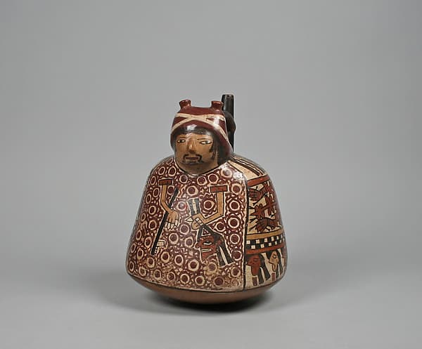 Spout-and-bridge bottle with warrior, by Nasca artist(s)