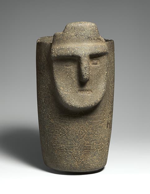 Beaker with face, by Condorhuasi-Alamito artist(s)