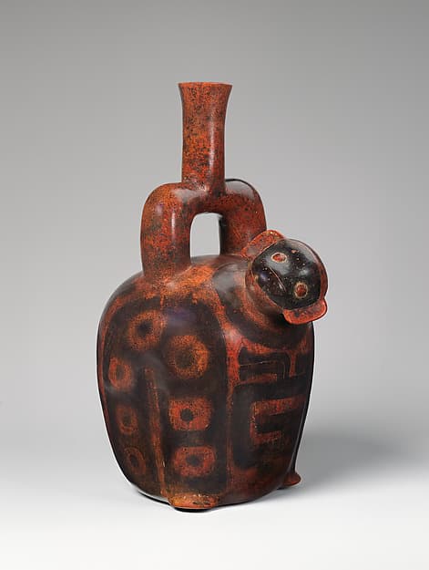 Stirrup-spout bottle with monkey and snake, by Cupisnique artist(s)
