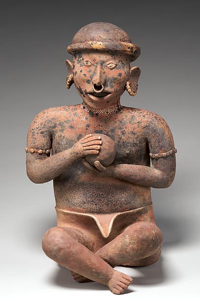 Seated male figure, by Nayarit artist(s)