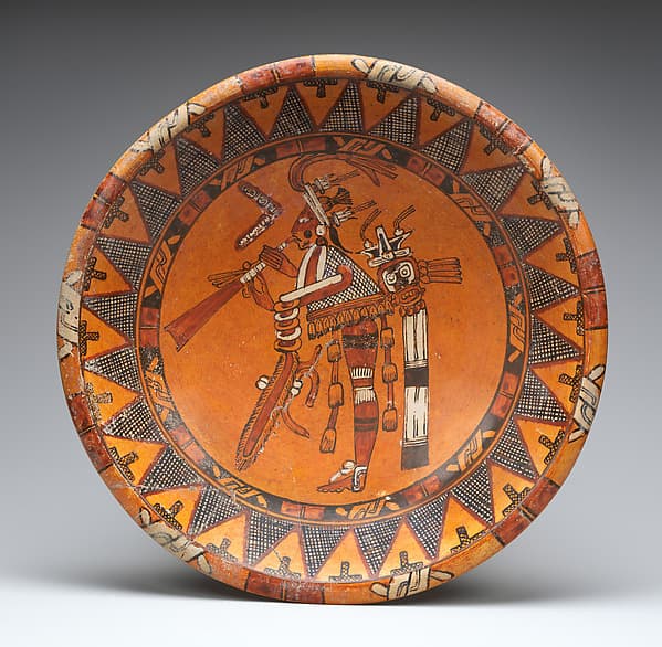 Plate with trumpeter, by Maya artist(s)