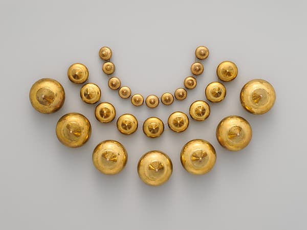 Necklace with conical beads, by Moche artist(s)