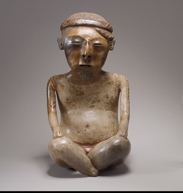 Seated male figure, by Lagunillas artist(s)