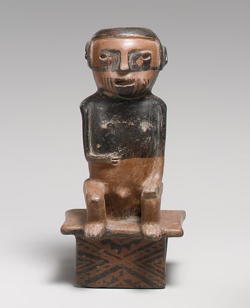 Coca chewer on bench, by Capulí artist(s)