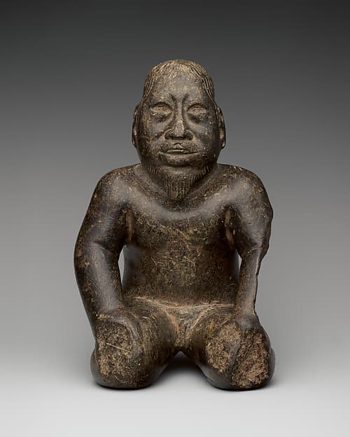 Kneeling bearded figure, by Olmec artist(s)