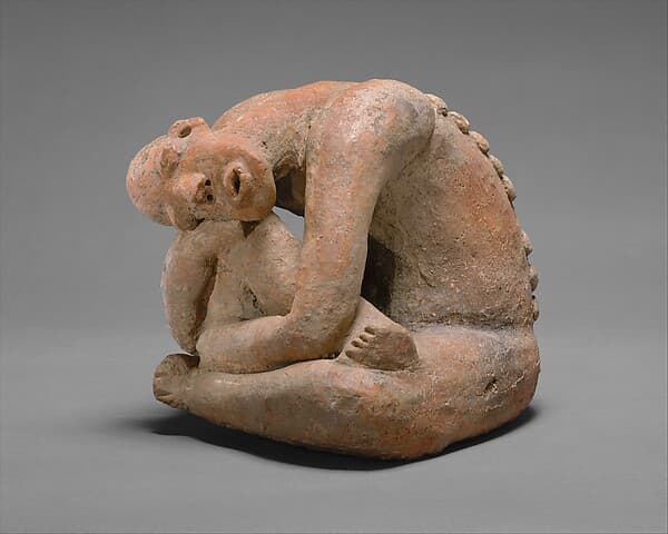 Seated figure, by Middle Niger artist