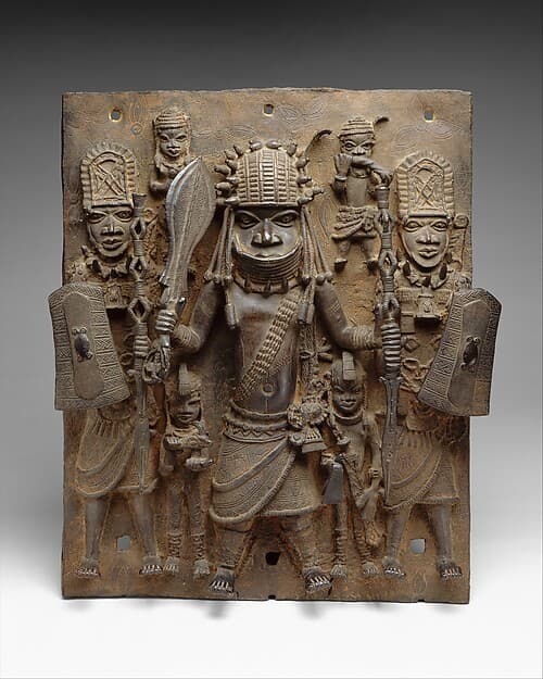 Plaque with Warrior and Attendants, by Ìgùn Ẹ́rọ̀nwwọ̀n (brass-casting guild) artists