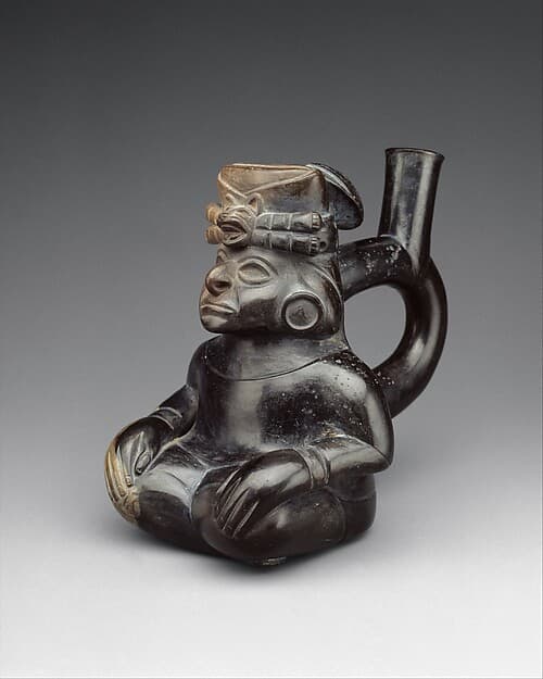 Stirrup-spout bottle with seated figure, by Moche artist(s)