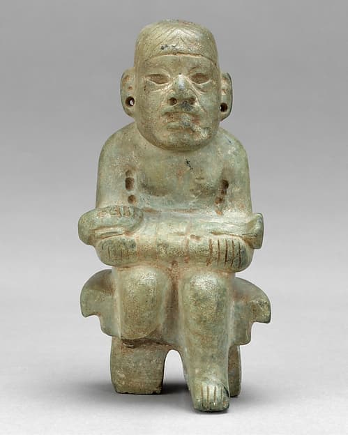 Figure seated on a bench, by Olmec artist(s)