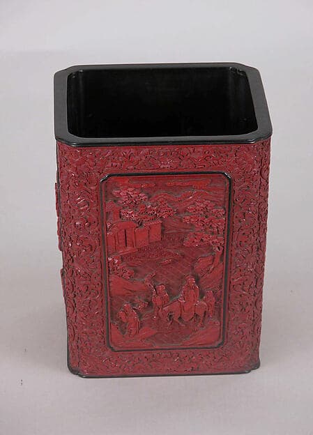Brush holder with scholars