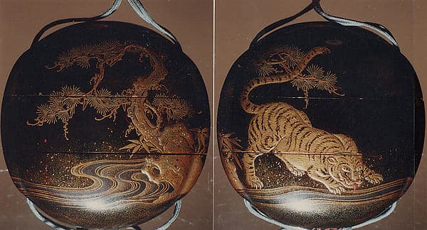 Inrō with Tiger Drinking from a River beside Rocks and Pine Tree
