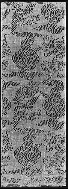 Sutra cover with dragons and phoenixes amid clouds