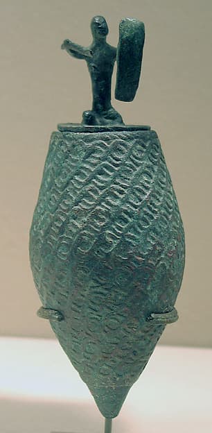 Lime Container Topped by a Warrior