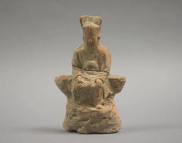Figure of a seated official