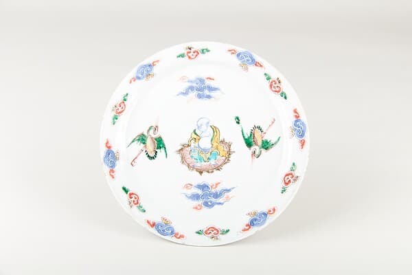 Plate with Buddhist monk Budai