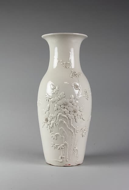 Vase with plum blossom and bamboo