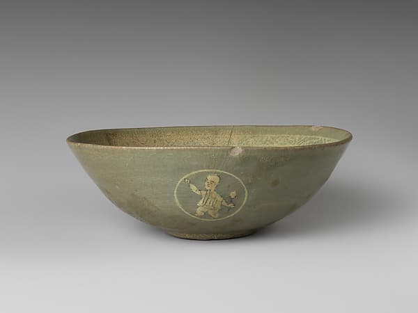 Bowl with boys and grapevines