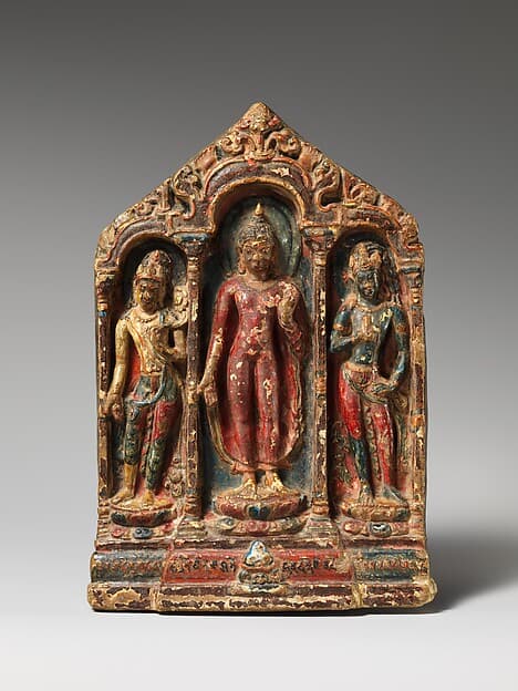 Buddha flanked by Avalokiteshvara-Padmapani and Vajrapani