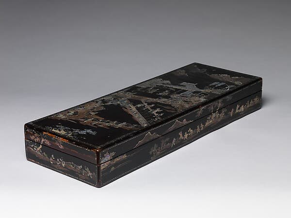 Box with scene of a reception and boys at play