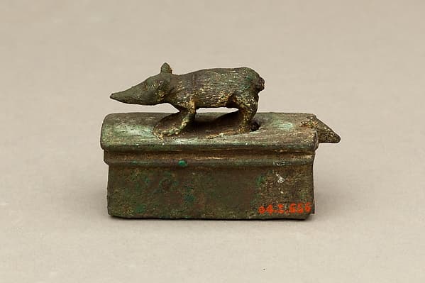 Shrew-mouse surmounting shrine-shaped box for an animal mummy