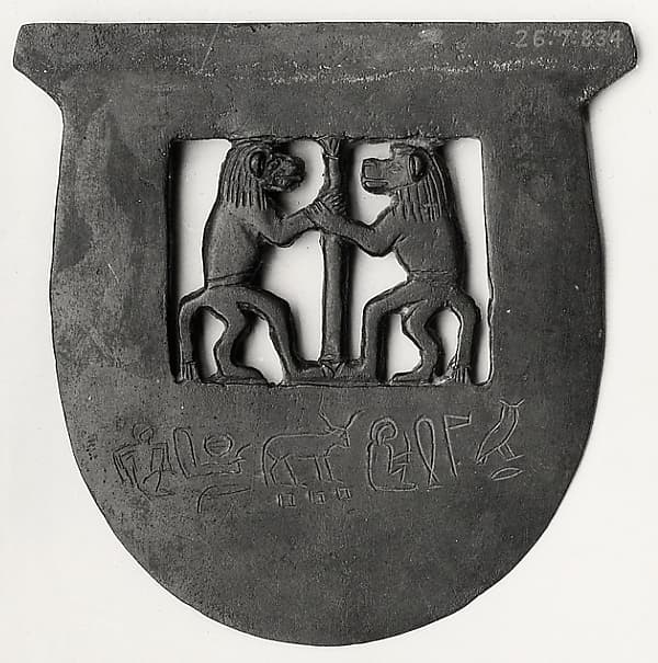 Ax head inscribed for Khumeh with two baboons and a papyrus column
