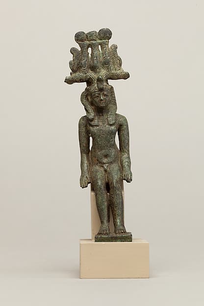 Child god in nemes and hemhem