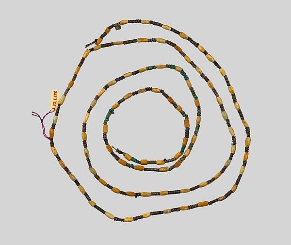 String of cylindrical beads