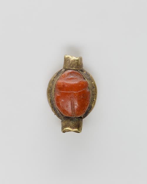 Scarab set in a ring bezel