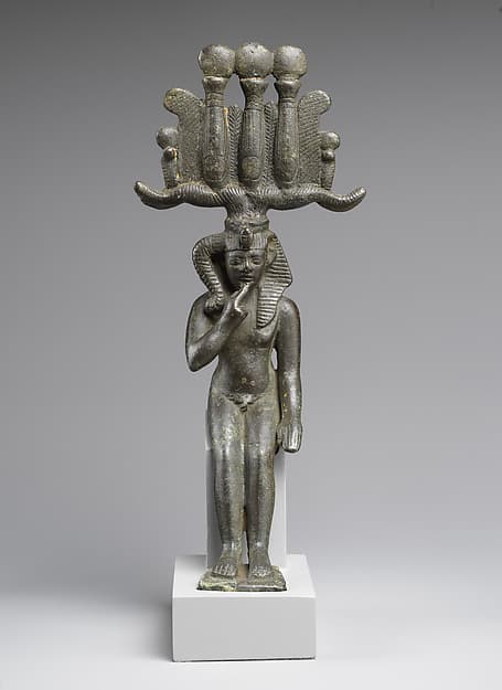 Child god in nemes and hemhem crown