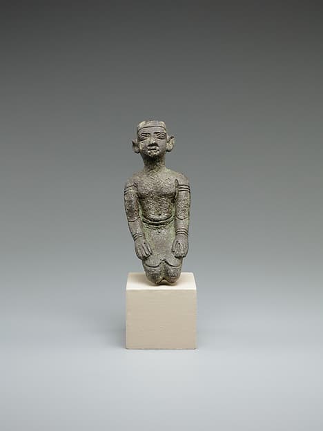 Kneeling priest