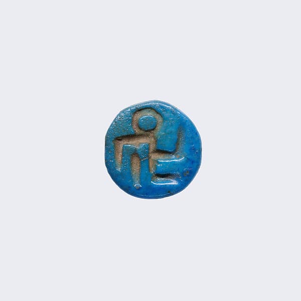 Design Amulet with Pierced Shank, Device of Squatting Child Facing Right