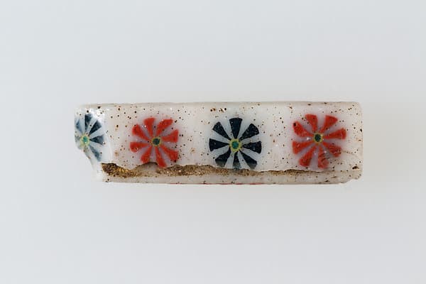 inlay with row of rosettes