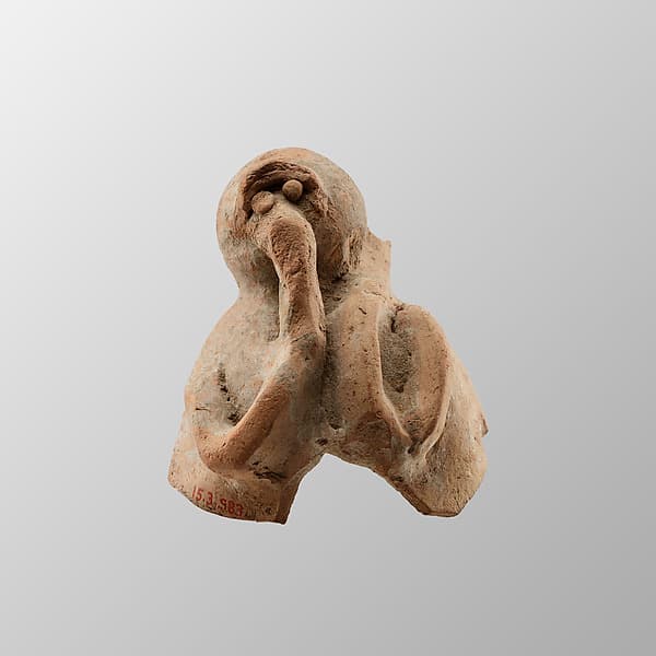 Vase fragment in the shape of a monkey