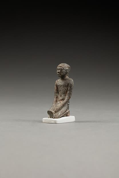 Kneeling Priest, Pouring Libation