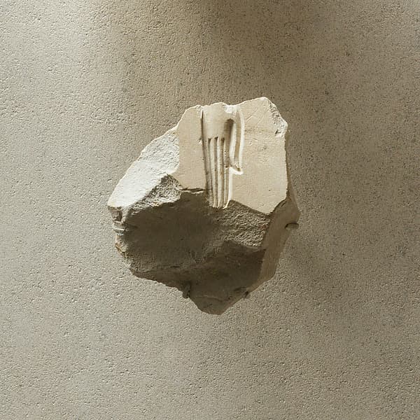 Relief fragment from a procession of attendants - see 31.3.1-1