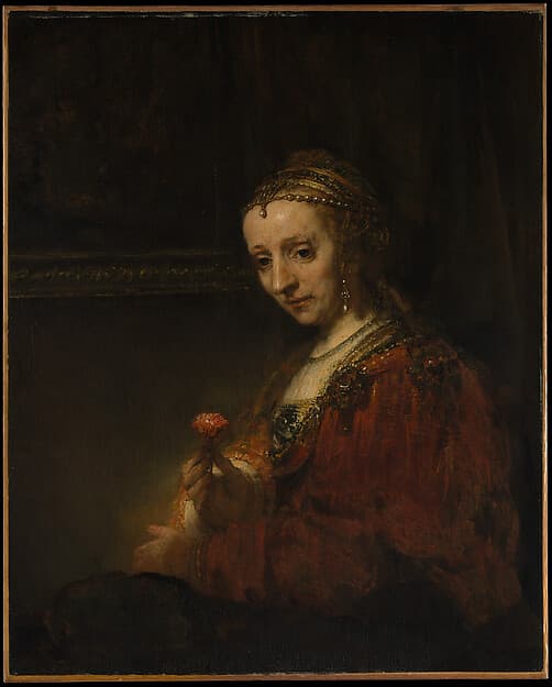 Woman with a Pink, by Rembrandt (Rembrandt van Rijn)