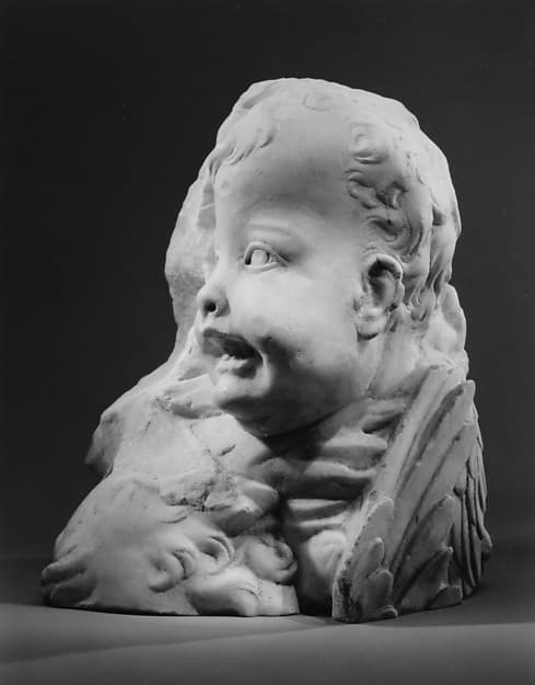 Head and wings of an angel and forehead of another, by Antonio Rossellino