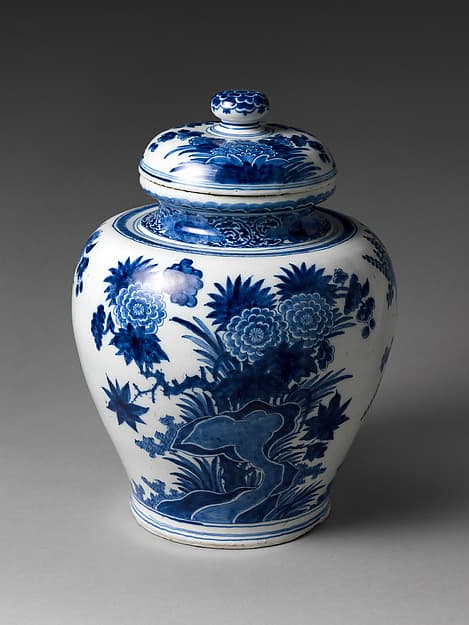 Jar with chrysanthemums and rocks, by De drie Vergulde Astonnenkens