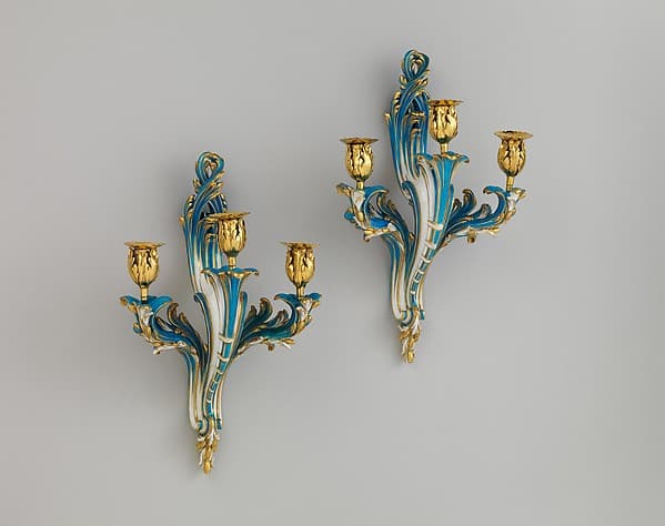 Two wall sconces (Bras de cheminée), by Jean-Claude Duplessis