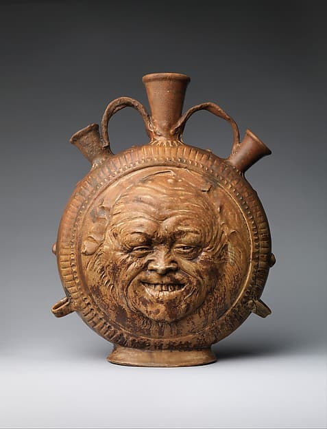 Flask with face, by Jean-Joseph Carriès