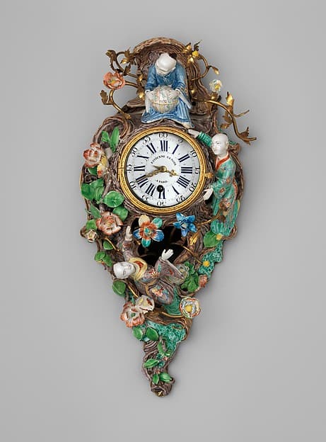 Wall clock (cartel), by Etienne LeNoir